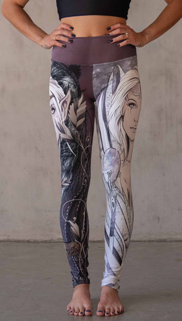 Model wearing WERKSHOP Elf + Sorceress Mashup leggings. The leggings are printed with original artwork by Chriztina Marie. One leg features a dark forest elf wearing a fur trimmed cloak. The other leg features a winter sorceress holding an orb with frosted purples and lavender tones.