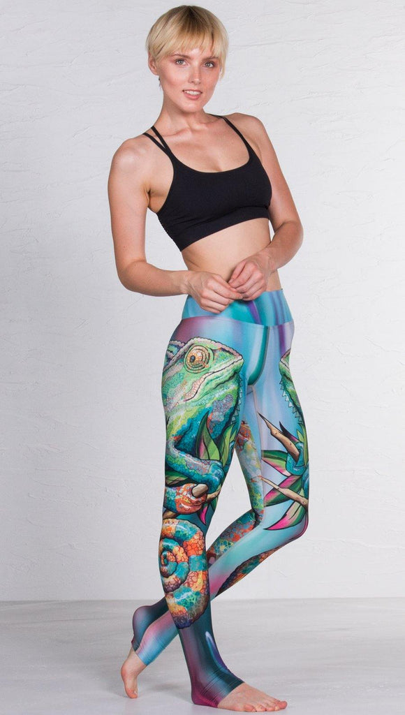 right side view of model wearing colorful chameleon printed full length leggings