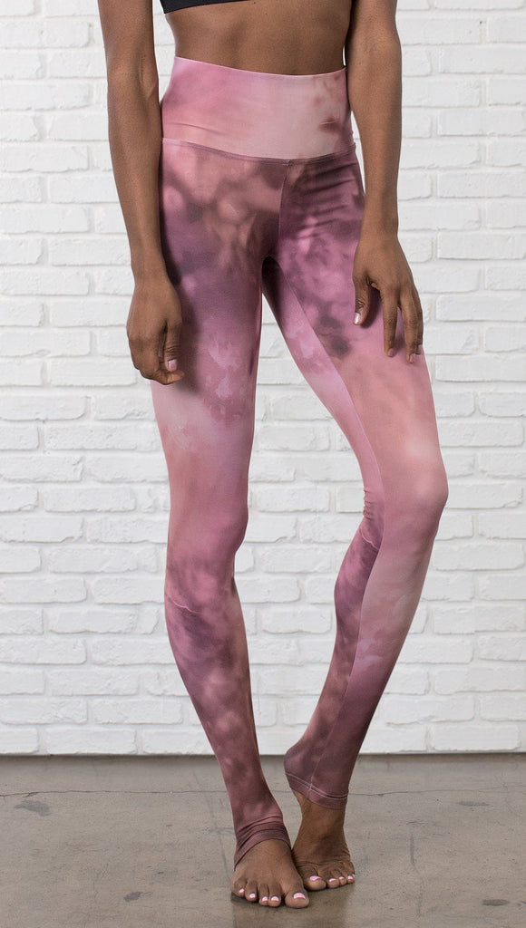 closeup front view of model wearing rose quartz stone design printed full length leggings