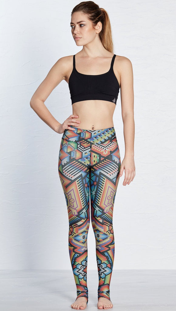 front view of model wearing beaded themed printed full length leggings with eagle motif