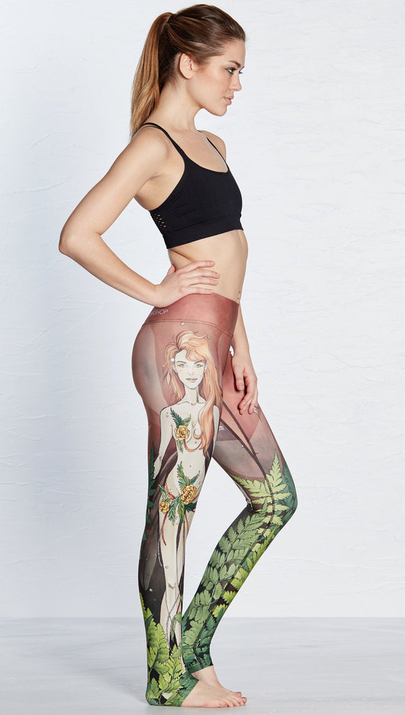 right side view of model wearing pixie themed printed full length leggings