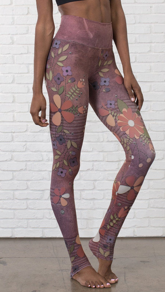 close up front view of model wearing vintage flower pattern printed full length leggings