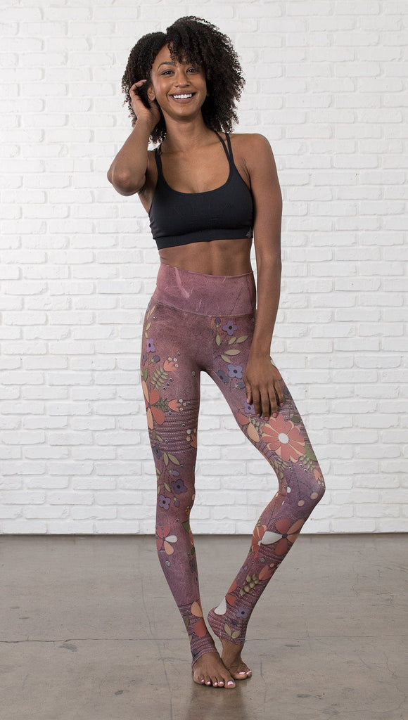 front view of model wearing vintage flower pattern printed full length leggings