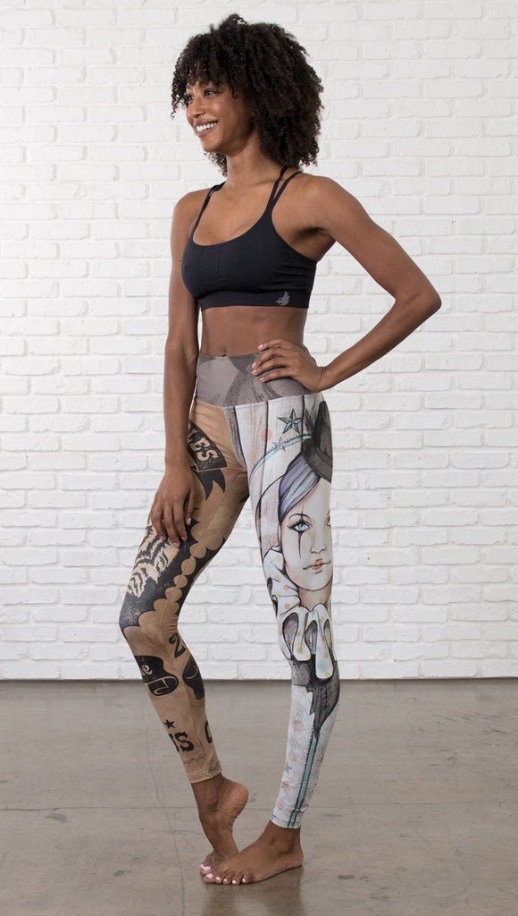 slightly turned side view of model wearing circus design mashup printed full length leggings