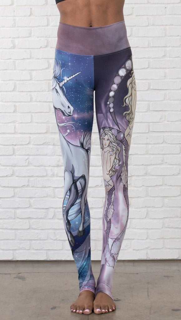 front view of model wearing full length leggings with unicorn and mermaid mashup printed design