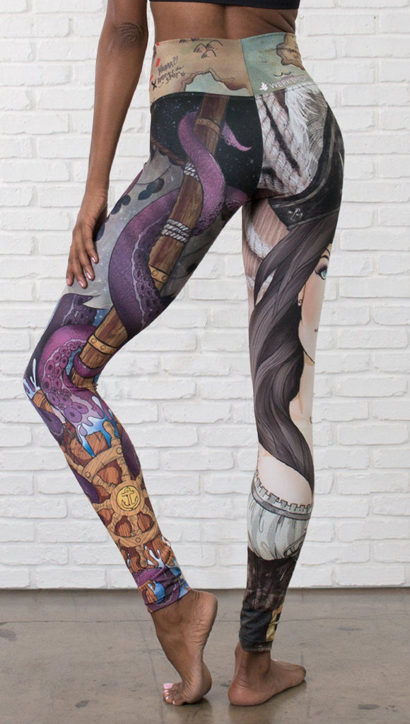 close up back view of model wearing pirate girl mashup themed printed capri leggings