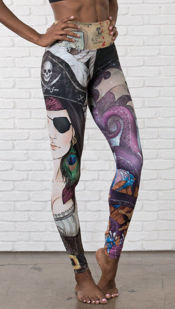 close up front view of model wearing pirate girl mashup themed printed capri leggings