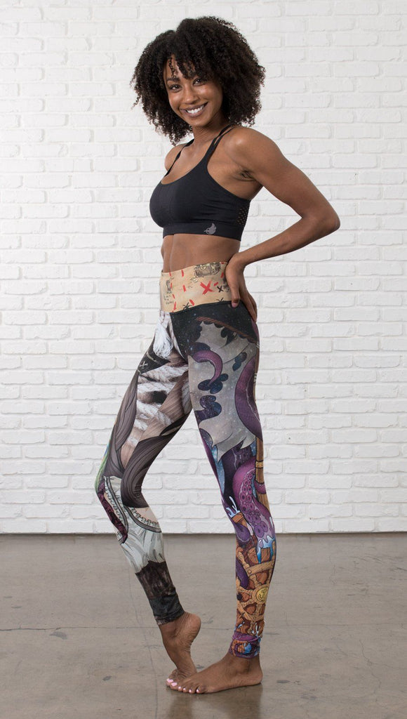 left side view of model wearing pirate girl mashup themed printed capri leggings