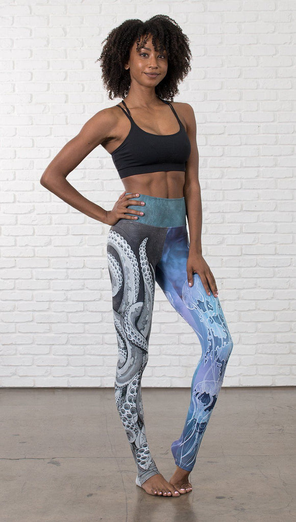 front view of model wearing ocean themed tentacles and jellyfish mashup design printed full length leggings