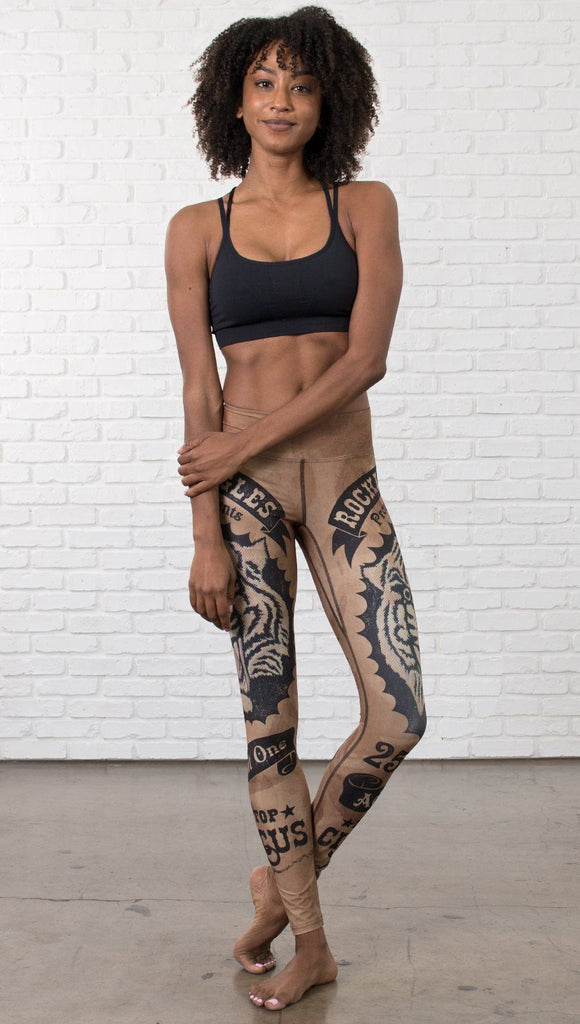 front view of model wearing vintage circus tiger printed full length leggings