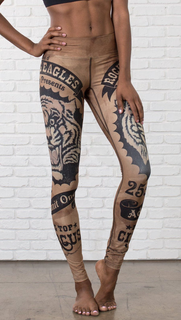 closeup front view of model wearing vintage circus tiger printed full length leggings