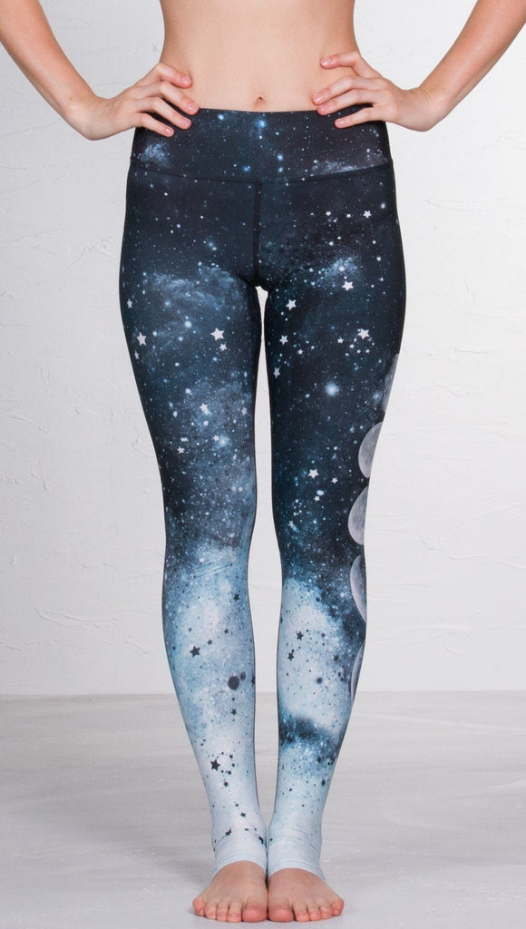 closeup back view of model wearing moon cycle design printed full length leggings