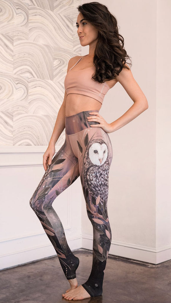 front view of model wearing owl themed full length leggings