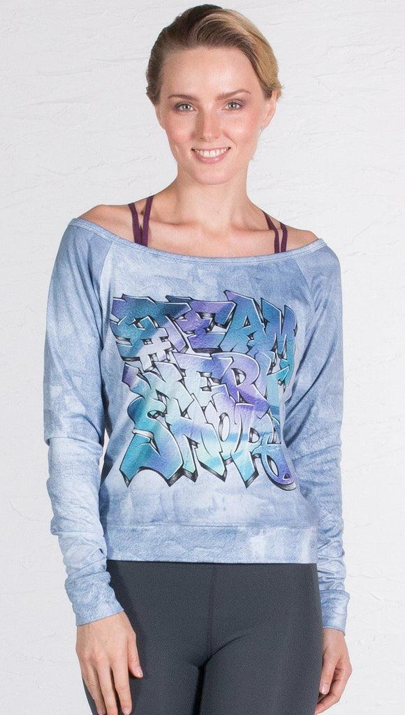 front view of model wearing graffiti design pullover 