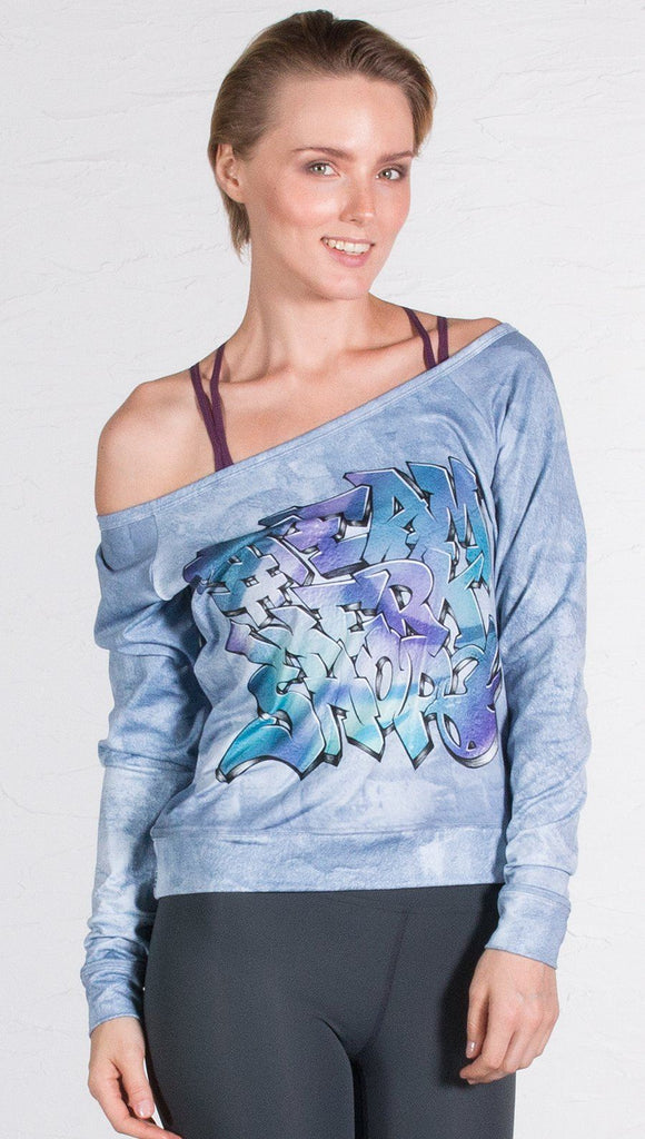 front view of model wearing graffiti design pullover 