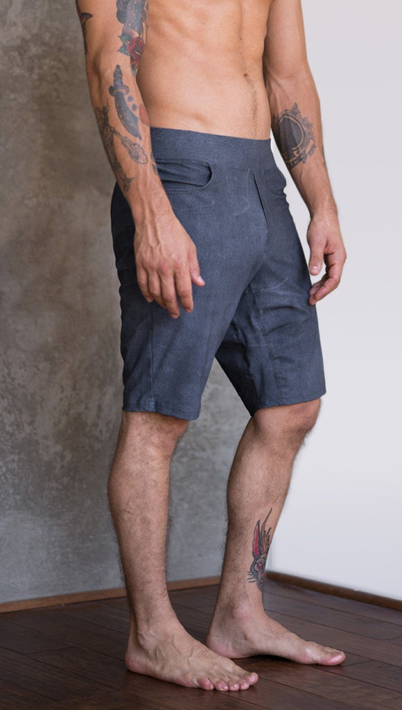 closeup right side view of model wearing slate mens performance shorts