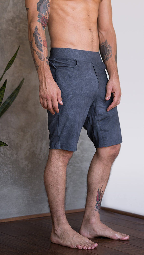 closeup right side view of model wearing slate mens performance shorts