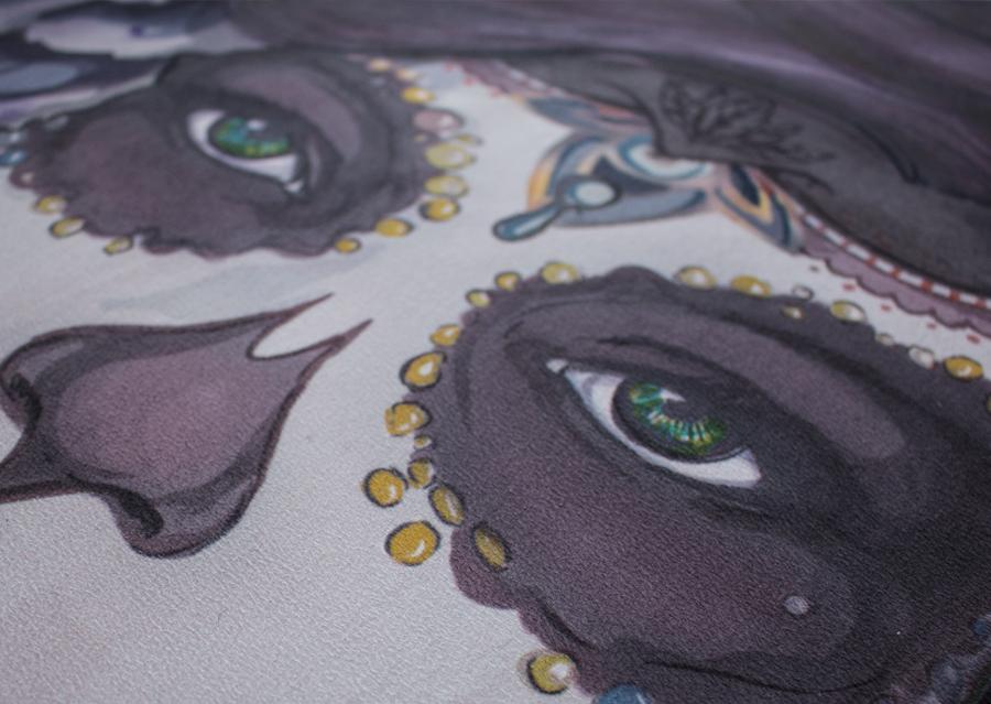 closeup view of design of sugar skull themed yoga mat