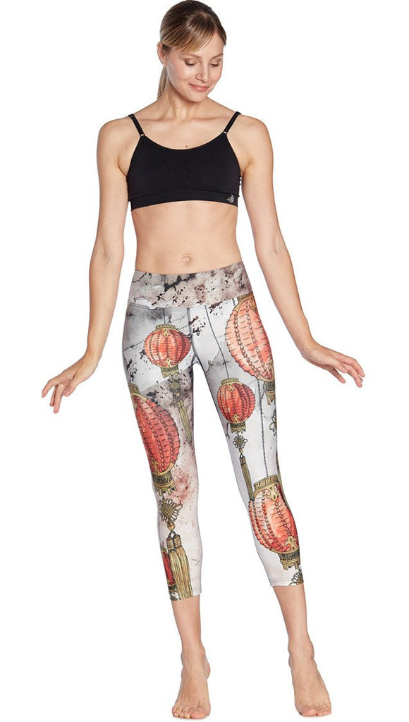 front view of model wearing Chinese festival lanterns themed printed capri leggings