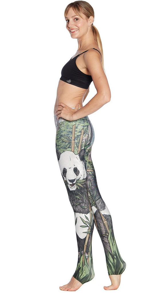 left side view of model wearing panda themed printed full length leggings