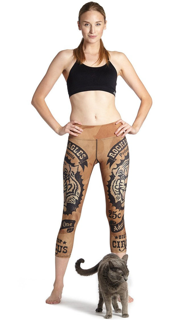 front view of model wearing vintage circus tiger printed capri leggings